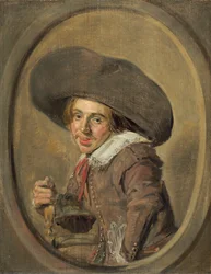 Un jeune homme avec un grand chapeau